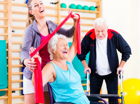 elderly couple having a physical therapy session