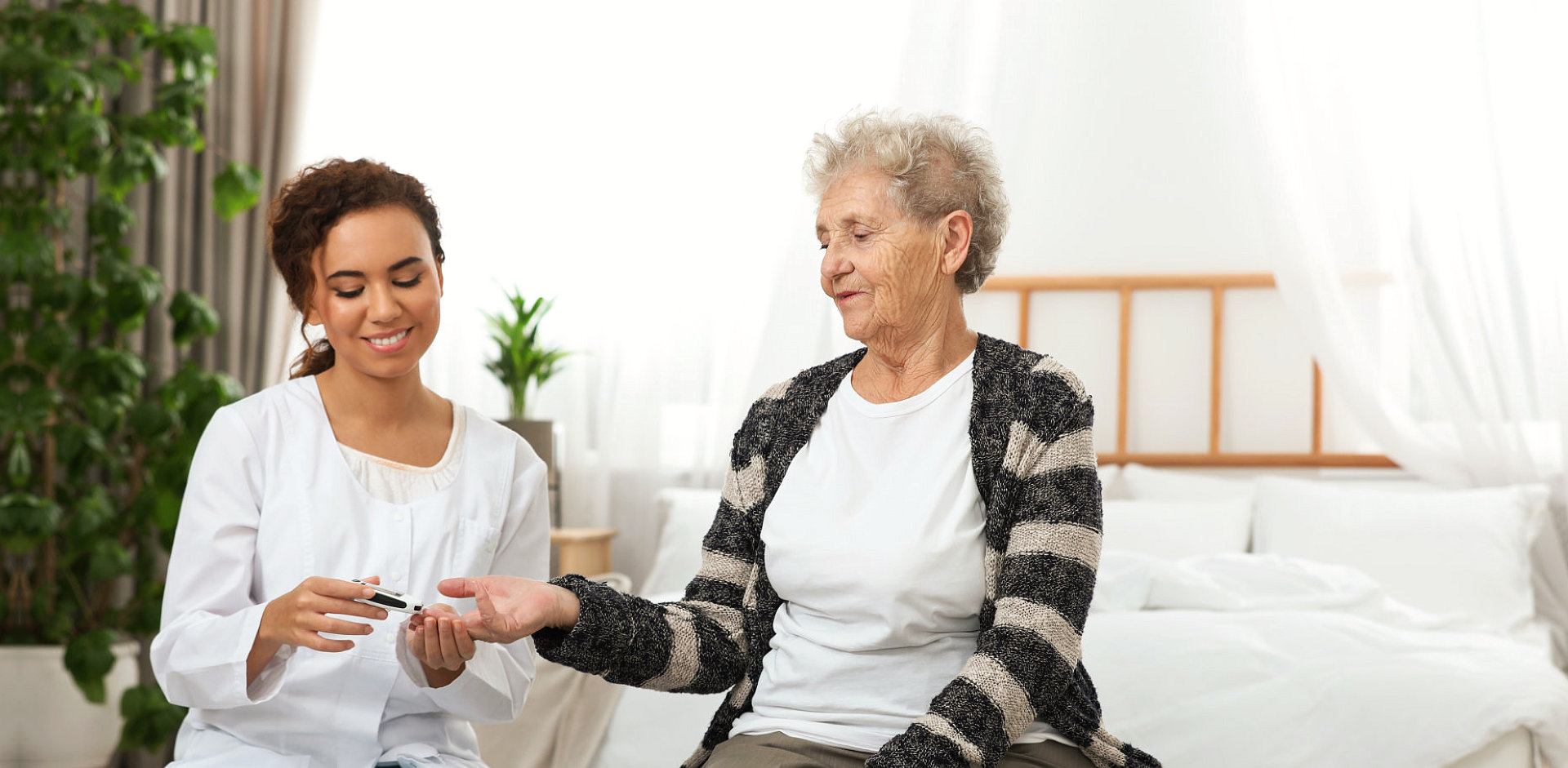 elder woman and her caregiver