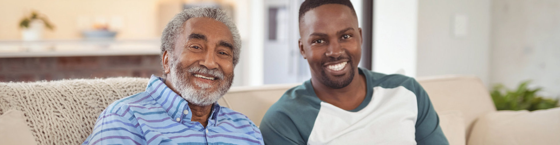 smiling father and son